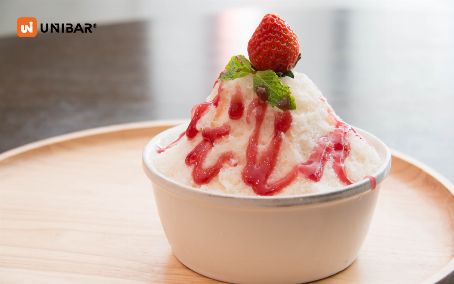 Bingsu phô mai truyền thống Hàn Quốc với đá bào mịn và topping phô mai đa dạng