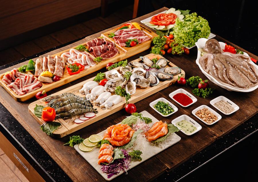 Không gian bên trong nhà hàng buffet lẩu topokki Dookki tại Vincom Lê Thánh Tông Hải Phòng rộng rãi và hiện đại